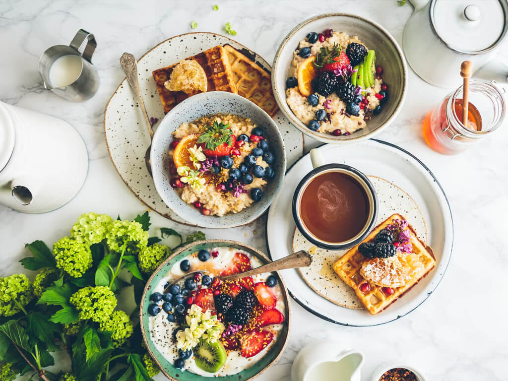 Restaurant customers enjoying pizza